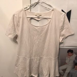 A shirt with a heart cut out on the back